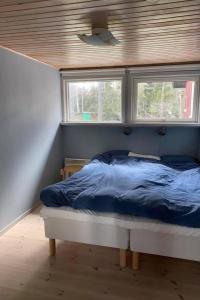 Postel nebo postele na pokoji v ubytování Holiday Home Väddö by Interhome