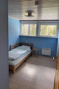 Postel nebo postele na pokoji v ubytování Holiday Home Väddö by Interhome