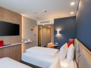 Postel nebo postele na pokoji v ubytování Holiday Inn Express - Hamburg South A7-AS42 by IHG