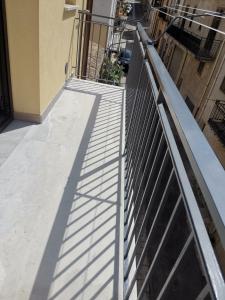a metal railing on the side of a building at Casa Vacanze del Golfo in Castellammare del Golfo