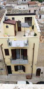 an aerial view of a building with a balcony at Casa Vacanze del Golfo in Castellammare del Golfo