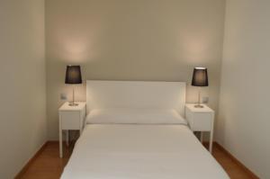 Posteľ alebo postele v izbe v ubytovaní Girona Housing Ginesta 9