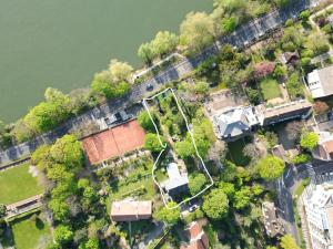 an aerial view of a house next to a river at Pousada Bertin in Chatou