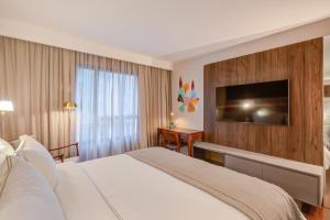 Cama ou camas em um quarto em Qoya São Paulo Paulista, Curio Collection by Hilton