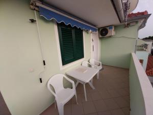Ein Balkon oder eine Terrasse in der Unterkunft Apartman Tamara