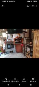 a view of a kitchen with a stove top oven at Chalet quota 1800 in Saint Jacques