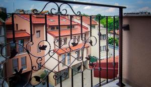 a view of a building from a balcony at Odrys Apartments in Plovdiv