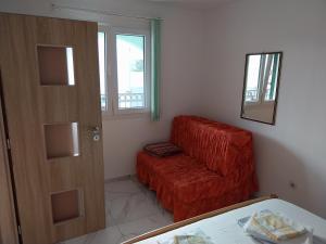 Ein Sitzbereich in der Unterkunft Apartman Tamara