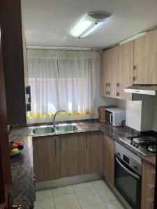 A cozinha ou cozinha compacta de Apartamento a 200m de Playa Morrongo