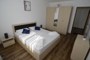 Postel nebo postele na pokoji v ubytování Casa Ali