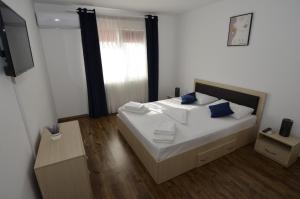 Postel nebo postele na pokoji v ubytování Casa Ali