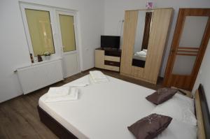 Postel nebo postele na pokoji v ubytování Casa Ali