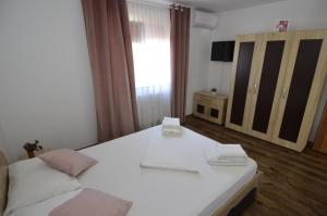 Postel nebo postele na pokoji v ubytování Casa Ali