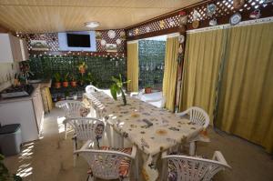 TV a/nebo společenská místnost v ubytování Casa Ali
