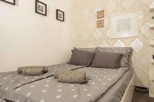 Postel nebo postele na pokoji v ubytování Paulay Design Apartment