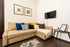 TV a/nebo společenská místnost v ubytování Paulay Design Apartment