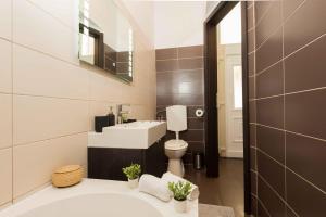 Koupelna v ubytování Paulay Design Apartment
