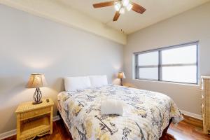 a bedroom with a bed and a window at Grandfather View in Sugar Mountain +29 photos