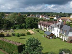 an aerial view of a large house with a large yard at Élégante suite familiale au cœur de la forêt de Montargis, à 1h30 de Paris - FR-1-590-342 in Paucourt +15 photos
