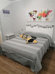 Postel nebo postele na pokoji v ubytování Le terrazze di casa Bonelli