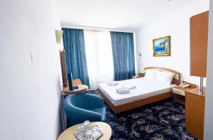 Postel nebo postele na pokoji v ubytování Hotel Sirena Saturn All Inclusive