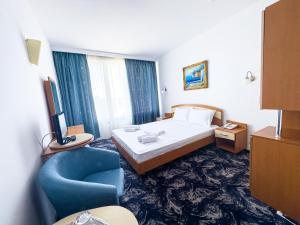 Postel nebo postele na pokoji v ubytování Hotel Sirena Saturn All Inclusive