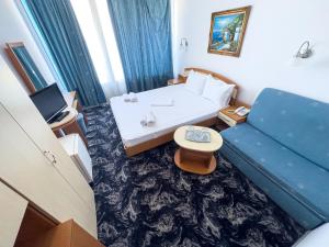 Postel nebo postele na pokoji v ubytování Hotel Sirena Saturn All Inclusive