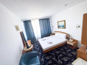 Postel nebo postele na pokoji v ubytování Hotel Sirena Saturn All Inclusive