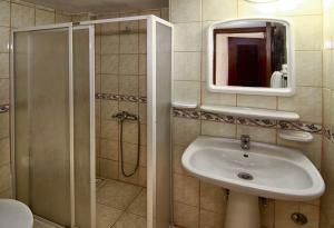 Koupelna v ubytování Agora Boutique Apart Hotel