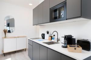 Kuchyň nebo kuchyňský kout v ubytování BRIGHT Hildesheim Angoulemeplatz
