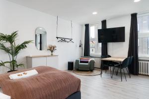 Postel nebo postele na pokoji v ubytování BRIGHT Hildesheim Angoulemeplatz