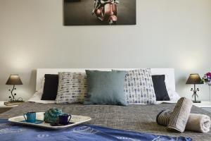 Łóżko lub łóżka w pokoju w obiekcie Aurora casa vacanze