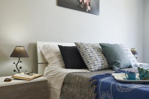 Łóżko lub łóżka w pokoju w obiekcie Aurora casa vacanze