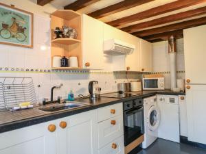Kuchyň nebo kuchyňský kout v ubytování Granary Cottage + 9 fotografií