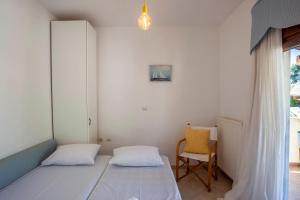 Postel nebo postele na pokoji v ubytování Casa Bianca Sea View