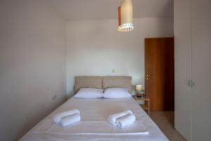 Postel nebo postele na pokoji v ubytování Casa Bianca Sea View