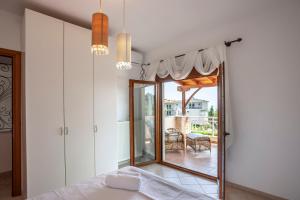 Postel nebo postele na pokoji v ubytování Casa Bianca Sea View