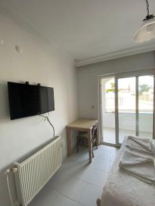 TV a/nebo společenská místnost v ubytování AY OTEL 2