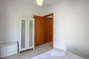 Postel nebo postele na pokoji v ubytování Casa Bianca Sea View
