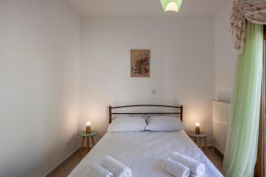 Postel nebo postele na pokoji v ubytování Casa Bianca Sea View