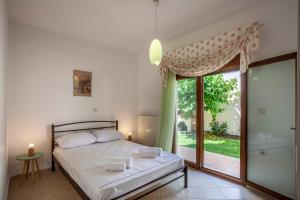 Postel nebo postele na pokoji v ubytování Casa Bianca Sea View