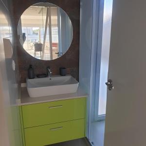 a bathroom with a sink and a mirror at Marinamed Residential Villa Sea View in Orihuela Costa