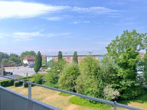 a view from a balcony of trees and a building at Studio Apartment In Herlev, Herlevgrdsvej 4, in Herlev