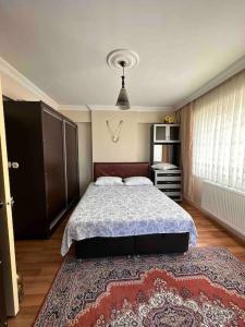 Ліжко або ліжка в номері Deniz Manzaralı Lüks Daire