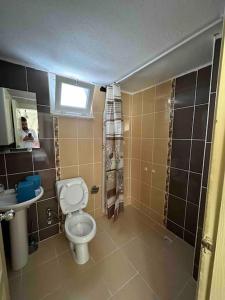Ванна кімната в Deniz Manzaralı Lüks Daire