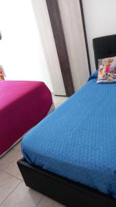 A bed or beds in a room at il Biscottino
