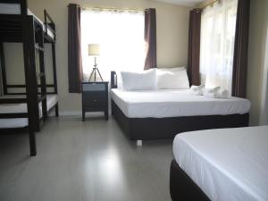 מיטה או מיטות בחדר ב-Guesthouse