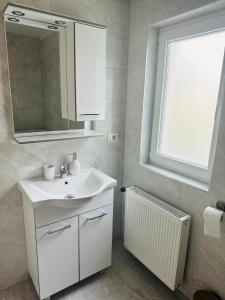 Koupelna v ubytování Apartmani LU&LO