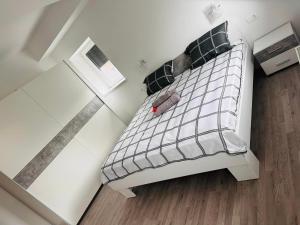 Postel nebo postele na pokoji v ubytování Apartmani LU&LO