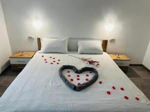 Postel nebo postele na pokoji v ubytování Apartmani LU&LO